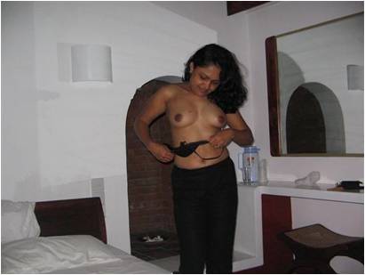 A sexy Tamil aunty is getting naughty with her horny young lover 1