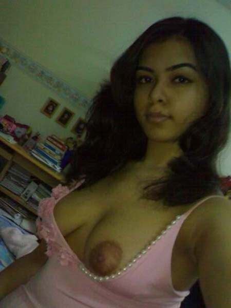 Beautiful college girl takes naughty selfies of her big boobs 2