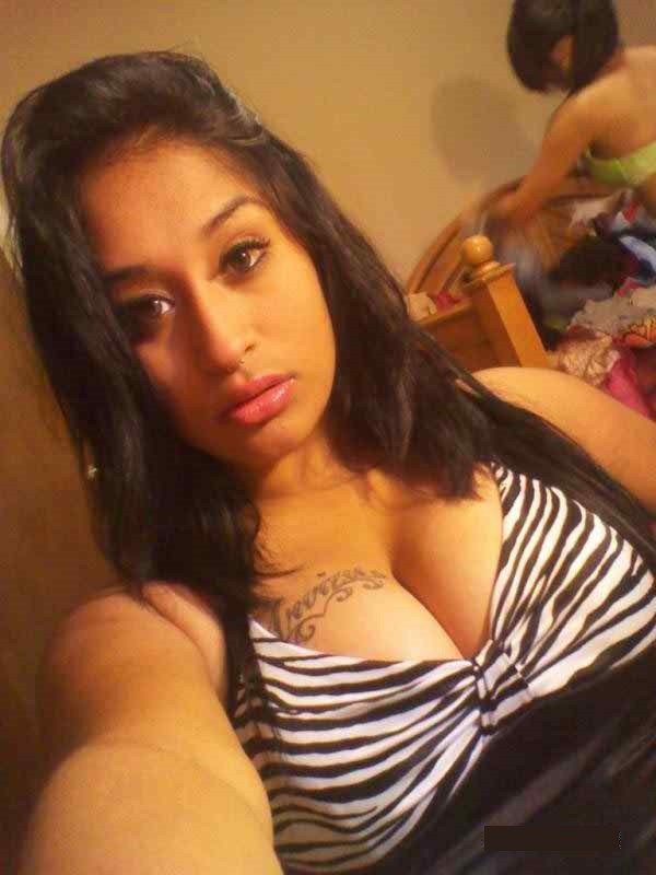 Beautiful college girl takes naughty selfies of her big boobs 9