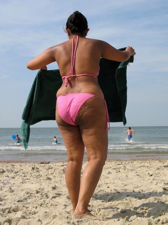 Big ass mature wife goes topless in the beach 5
