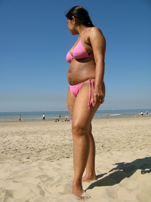 Big ass mature wife goes topless in the beach 7