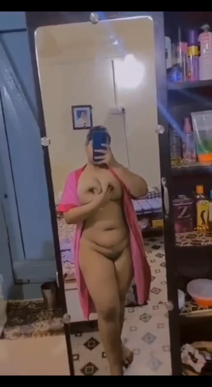 Busty MILF aunty naked before mirror photos 4