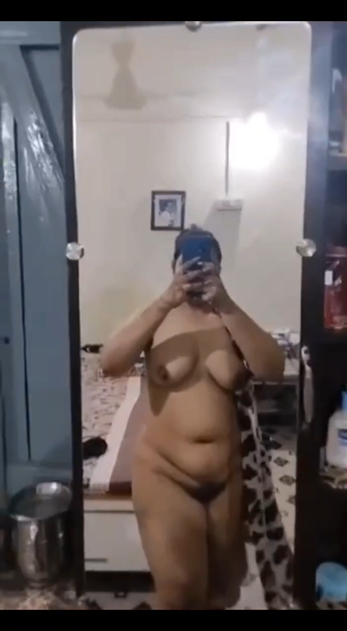 Busty MILF aunty naked before mirror photos 5
