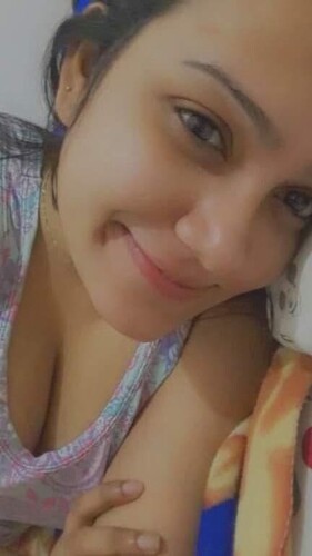 Cute Goan girl boobs showing with smiling face 3