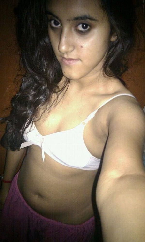 Indian skinny slut showing her small tits photos 1