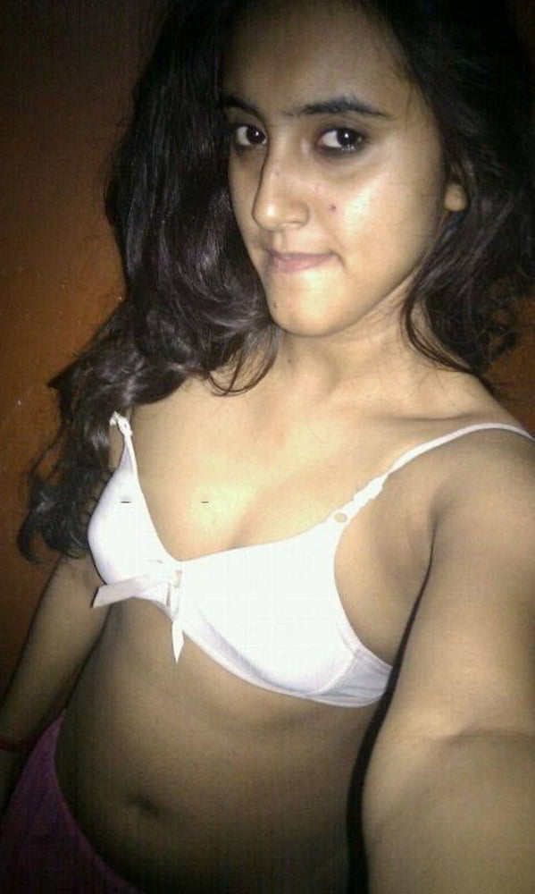 Indian skinny slut showing her small tits photos 3