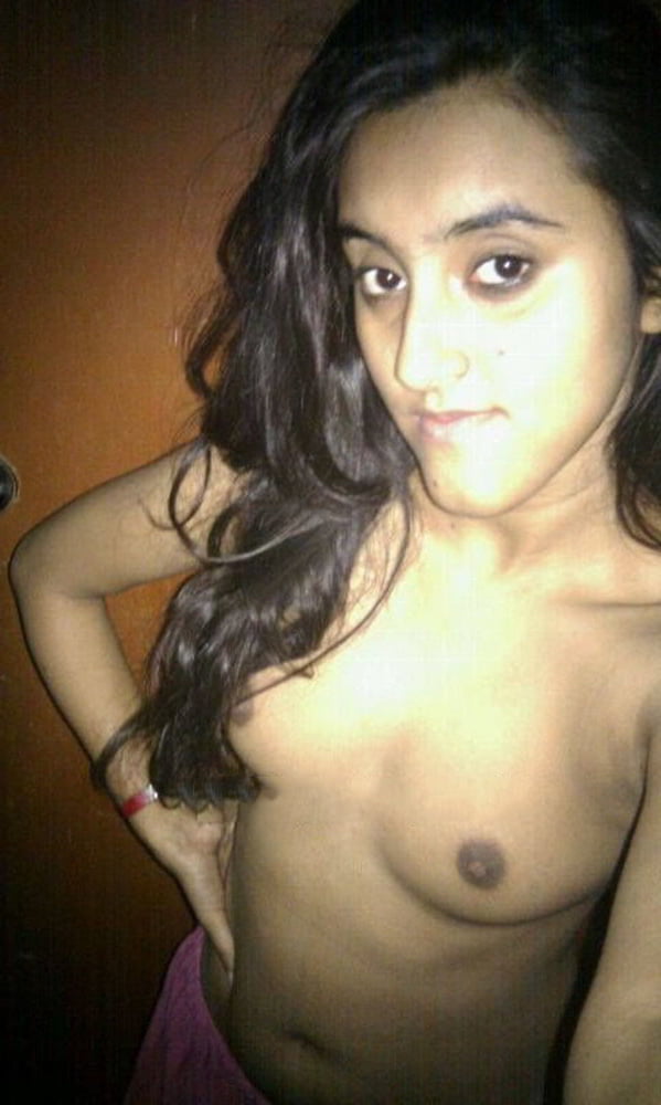 Indian skinny slut showing her small tits photos 5