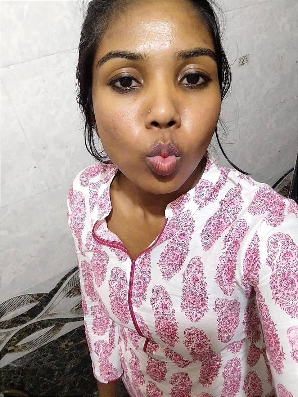 Naughty Tamil girl sniffing bra and panty 1