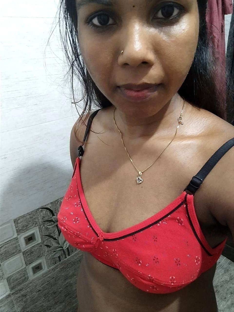 Naughty Tamil girl sniffing bra and panty 3