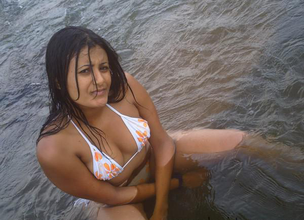 Nude bathing girl looks wet & wild 4