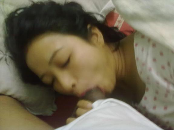 Porn pics of a beautiful girl giving an amazing blowjob to her lover 12