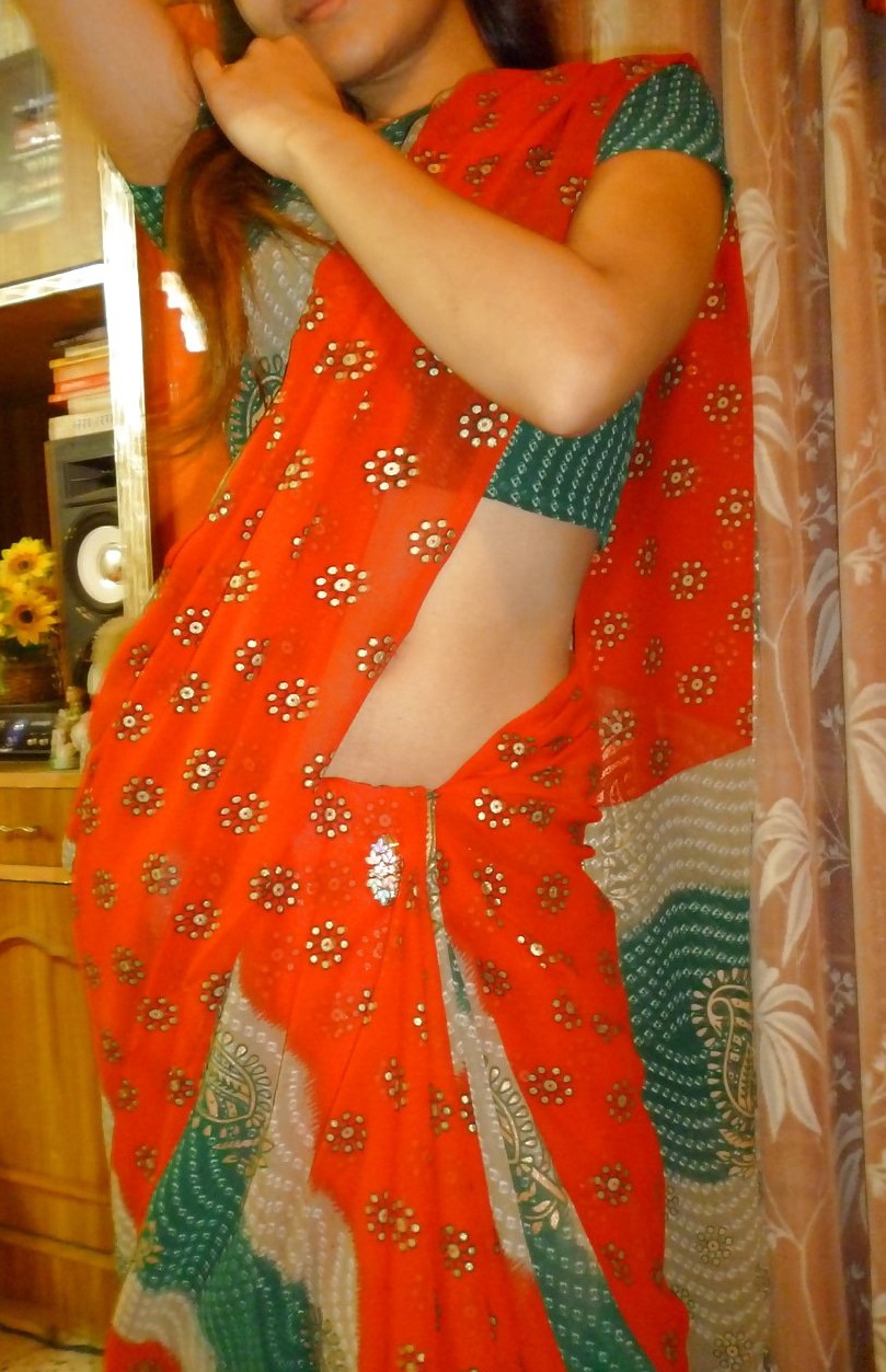 Slim Indian wife striptease pics 8