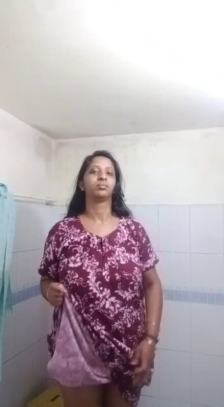 Unsatisfied Indian aunty stripping nude pics in bathroom 6