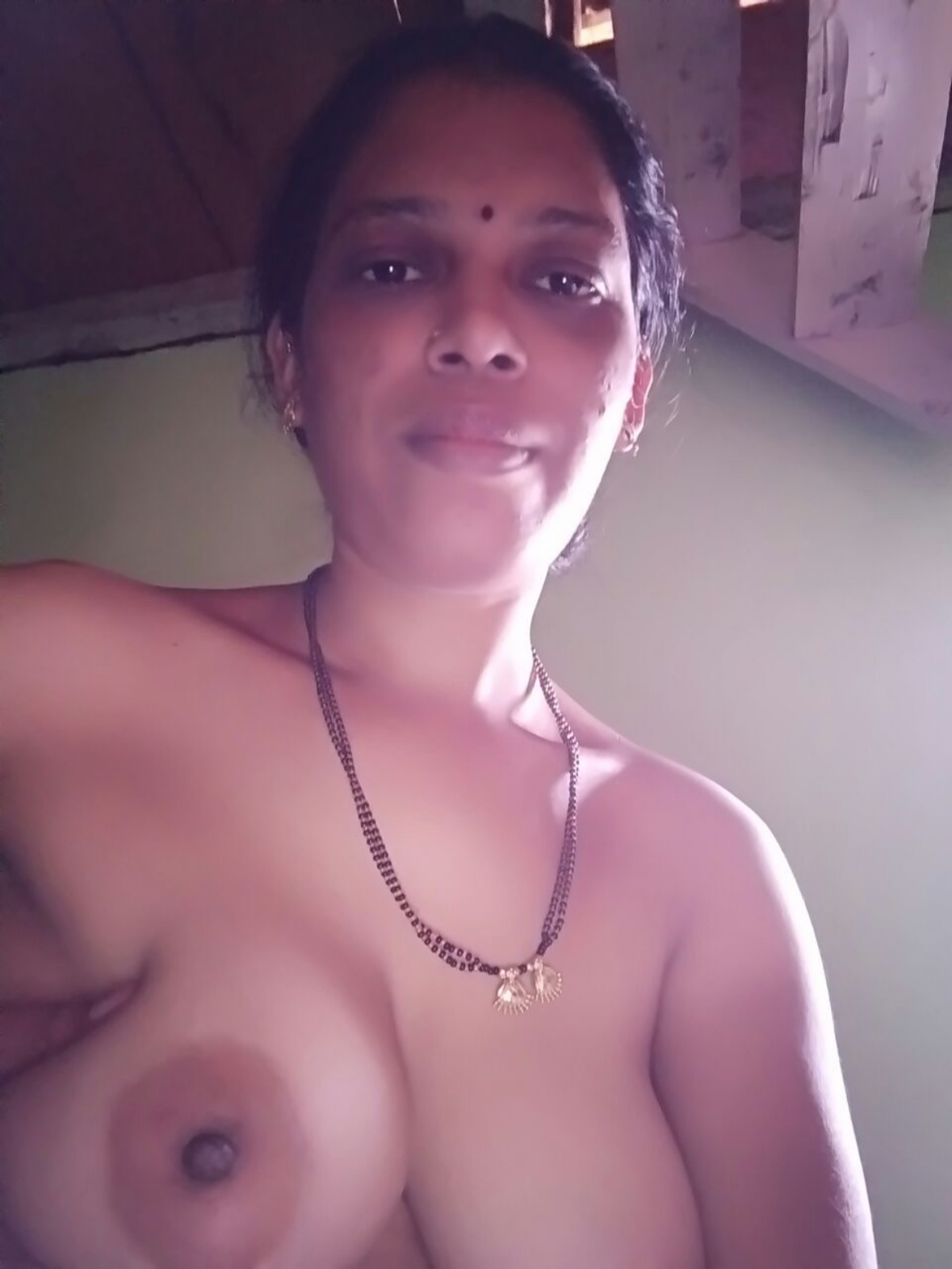 Village aunty selfie pics showing nude busty body 2