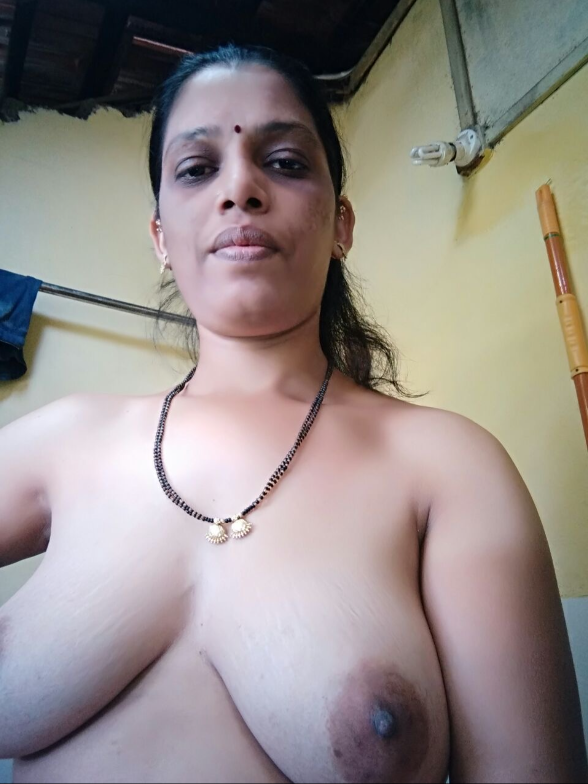 Village aunty selfie pics showing nude busty body 3
